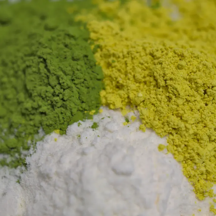 Three powders including matcha, quercetin, and Wellmune